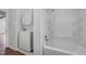 Clean bathroom with a stackable washer/dryer and shower/tub combo at 13832 Nc 96 N Hwy, Zebulon, NC 27597