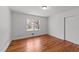 Bedroom with a closet and hardwood floors, offering a cozy and inviting space at 13832 Nc 96 N Hwy, Zebulon, NC 27597