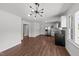 View of a modern kitchen with stainless steel appliances and stylish lighting fixtures at 13832 Nc 96 N Hwy, Zebulon, NC 27597