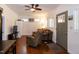 Cozy living room with ceiling fan, a comfortable recliner and a sofa at 142 Blackhawk Dr, Louisburg, NC 27549