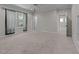 Spacious bedroom featuring neutral carpet, large window, and ceiling fan for a bright and airy space at 1512 Piazzo Ct, Apex, NC 27502
