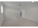 Large bedroom features plush carpeting, neutral walls, and ensuite access at 1512 Piazzo Ct, Apex, NC 27502