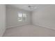 Bedroom features plush carpeting, crown molding, and a bright window at 1512 Piazzo Ct, Apex, NC 27502