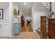 Welcoming foyer with tile floors, stairway and hardwood floors leading to the living area at 1512 Piazzo Ct, Apex, NC 27502