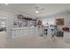 Large hobby room with built-in shelving and storage, a crafting table and ample workspace at 1512 Piazzo Ct, Apex, NC 27502