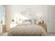 Comfortable bedroom with decorative clouds, bedside tables, and cozy bedding at 1572 Bright Coral Trl, Wendell, NC 27591