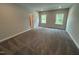 Large bedroom with neutral paint, plush carpets and 2 windows for plenty of natural light at 1572 Bright Coral Trl, Wendell, NC 27591
