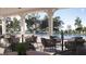 A community pool offers relaxing outdoor seating under a covered patio with lush landscaping at 1572 Bright Coral Trl, Wendell, NC 27591