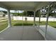 Relaxing screened porch with concrete flooring and views of the backyard at 1572 Bright Coral Trl, Wendell, NC 27591
