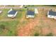 Aerial view capturing a home with a deck in a neighborhood with large lots and ample space at 170 Brookhaven Dr, Spring Hope, NC 27882