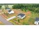 New construction home featuring a modern design, long driveway, and beautiful landscaping at 170 Brookhaven Dr, Spring Hope, NC 27882