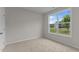 Bedroom featuring large window overlooking green landscape at 170 Brookhaven Dr, Spring Hope, NC 27882