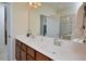 Double sink vanity offers extra counter space in this well-lit bathroom at 1914 Woodsdale Dr, Durham, NC 27703