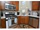 Well-equipped kitchen featuring stainless steel appliances, ample cabinet space, and modern finishes at 1914 Woodsdale Dr, Durham, NC 27703