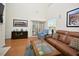 Comfortable living room with plenty of natural light, complemented by a cozy seating arrangement at 1914 Woodsdale Dr, Durham, NC 27703