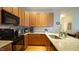 Modern kitchen with stainless steel appliances, granite countertops, and ample cabinet space at 201 Blithe Pl, Morrisville, NC 27560