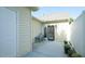 Back patio featuring a white privacy fence, green foliage, and space for seating at 201 Blithe Pl, Morrisville, NC 27560