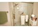Beautiful walk-in shower with white tiling, a shower seat, and a mounted shower head at 201 Blithe Pl, Morrisville, NC 27560