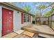 An outdoor deck in the backyard with a shed and a fenced yard at 229 Watson Dr, Burlington, NC 27217
