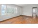 Bright living room with hardwood floors, ready for new furnishings at 229 Watson Dr, Burlington, NC 27217