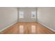 Comfortable bedroom featuring natural light and hardwood floors at 252 Shea Ct, Graham, NC 27253