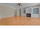 Spacious living room with hardwood floors, fireplace and built-in shelving at 252 Shea Ct, Graham, NC 27253