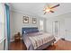 Inviting bedroom with hardwood floors, natural light, and a serene ambiance at 265 Mariah Towns Way, Garner, NC 27529