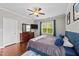 Spacious bedroom featuring a TV, dresser, and a window with natural light at 265 Mariah Towns Way, Garner, NC 27529