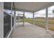Inviting screened porch with views of the backyard, ideal for outdoor relaxation at 2920 Huxley Way, Apex, NC 27502