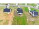 An overhead view showing backyards in a residential neighborhood at 295 Springtooth Dr, Zebulon, NC 27597