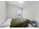 Cozy bedroom features a window for natural light at 295 Springtooth Dr, Zebulon, NC 27597
