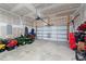 Spacious garage interior with ample space for vehicles and equipment at 295 Springtooth Dr, Zebulon, NC 27597