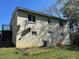 Backyard featuring a cream-colored exterior and satellite dishes at 308 San-Lee Drive Dr, Sanford, NC 27330