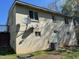 Backyard featuring a cream-colored exterior and satellite dishes at 308 San-Lee Drive Dr, Sanford, NC 27330