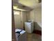 Laundry room with a white washing machine, dryer, and two access doors at 308 San-Lee Drive Dr, Sanford, NC 27330