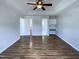 Large main bedroom offering great closet space, hard wood floors, and natural light at 312 Sarazen Dr, Clayton, NC 27527