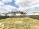 Expansive backyard with a wooden fence, providing privacy and a green space at 3521 Strawberry Patch Row, Raleigh, NC 27604