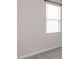 Bright room with plush carpeting, white trim, a window, and a neutral wall color at 3521 Strawberry Patch Row, Raleigh, NC 27604