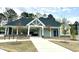 Elegant community clubhouse with manicured landscaping, creating a welcoming atmosphere at 3521 Strawberry Patch Row, Raleigh, NC 27604