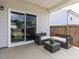 Cozy covered patio with outdoor furniture, offering a relaxing space at 3521 Strawberry Patch Row, Raleigh, NC 27604