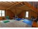 Unfinished attic space with exposed wood framing, offering potential for customization and expansion at 3881 Whisperwood Ct, Youngsville, NC 27596