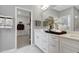 Bright bathroom with a white vanity, modern fixtures, and a view of the closet at 4015 Jasper Olive Rd # 30, Apex, NC 27523