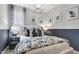 Beautiful bedroom features patterned bedding and decorative accents at 4015 Jasper Olive Rd # 30, Apex, NC 27523