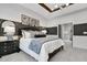 Stylized bedroom with a gray accent wall, tray ceiling, and contemporary furnishings at 4015 Jasper Olive Rd # 30, Apex, NC 27523