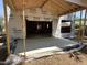 Unfinished outdoor patio area showcasing a brick foundation and framed structure at 406 Columbia Dr, Raleigh, NC 27604
