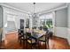 Elegant dining room with wood floors, chandelier, and abundant natural light at 4769 Swordfish Dr, Raleigh, NC 27603