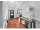 Bright and inviting foyer with hardwood floors and stylish decor at 4769 Swordfish Dr, Raleigh, NC 27603
