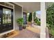 Inviting covered front porch with a seating area and stylish decor at 4769 Swordfish Dr, Raleigh, NC 27603