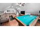 Finished attic game room with a pool table, entertainment area, and unique display at 4769 Swordfish Dr, Raleigh, NC 27603