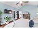 Spacious main bedroom with hardwood floors, neutral walls, and a private entrance to the exterior at 4769 Swordfish Dr, Raleigh, NC 27603